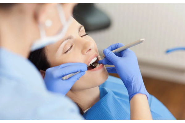 Прием стоматолога парадонтолога
