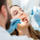 Первичный осмотр  стоматолога имплантолога